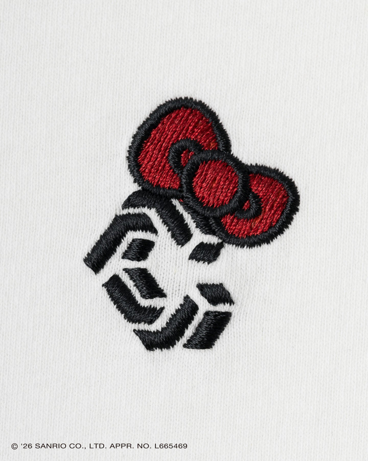 CRONOS × HELLO KITTY Big Tee White front embroidery detail